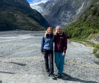 Image of Elise beside the mountains