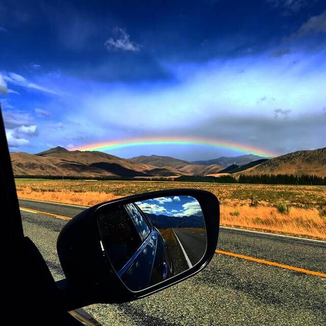 Rainbow in the car mirror