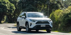 Image of a Hyundai iMax People Carrier parked up at a New Zealand vineyard with rows of vines in the background